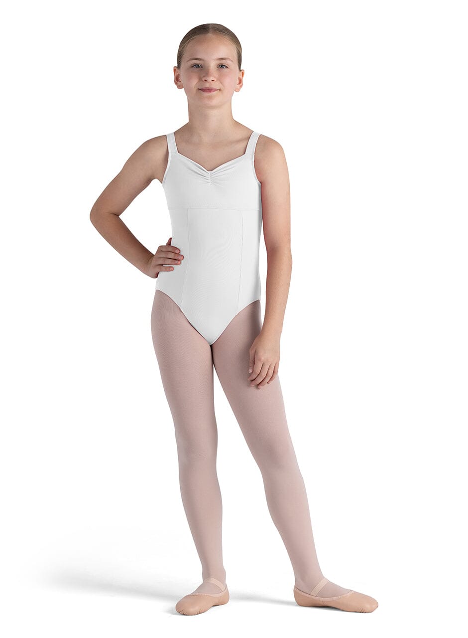 Young girl wearing a white leotard and pink tights on a white background