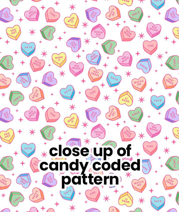 Close-up of colorful candy heart pattern with text overlay on a white background