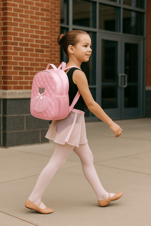 Little girl dancer with pink backpack walking to dance class