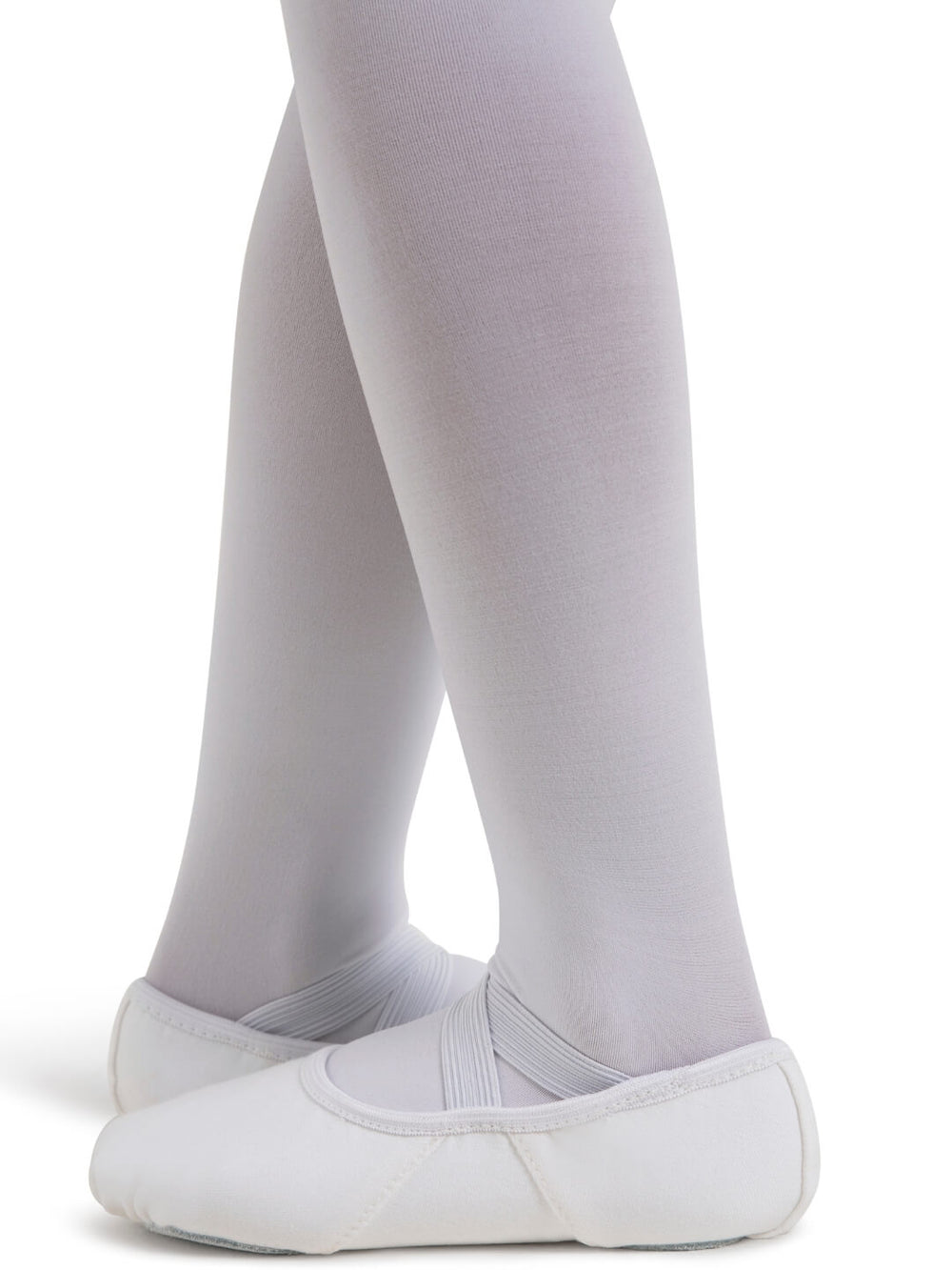 White ballet shoes and tights on a white background