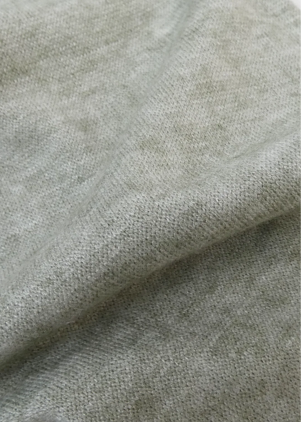 Close-up of textured green fabric