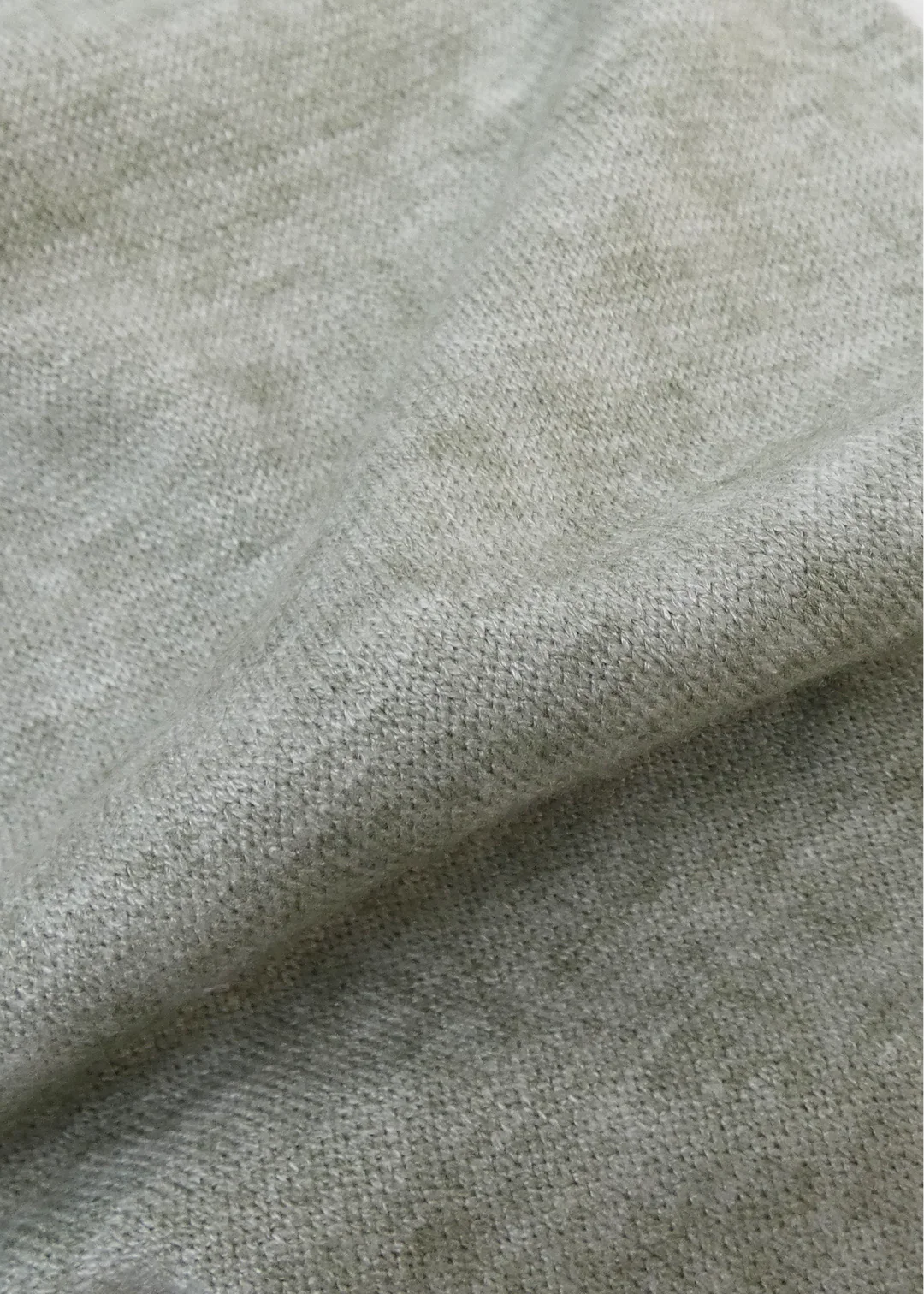 Close-up of textured green fabric