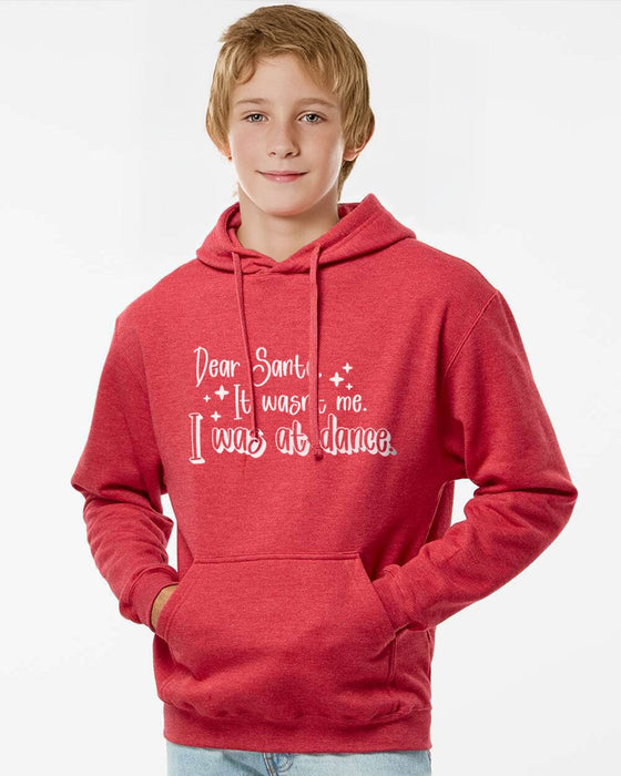 Child wearing a red hoodie with text on a white background