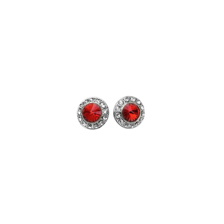 Pair of round earrings with red gemstones on a white background