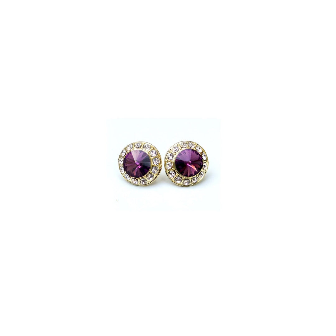 Gold earrings with purple gemstones on a white background