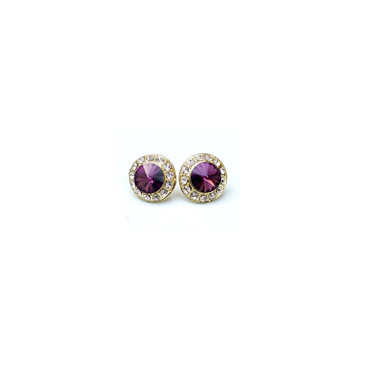 Gold earrings with purple gemstones on a white background