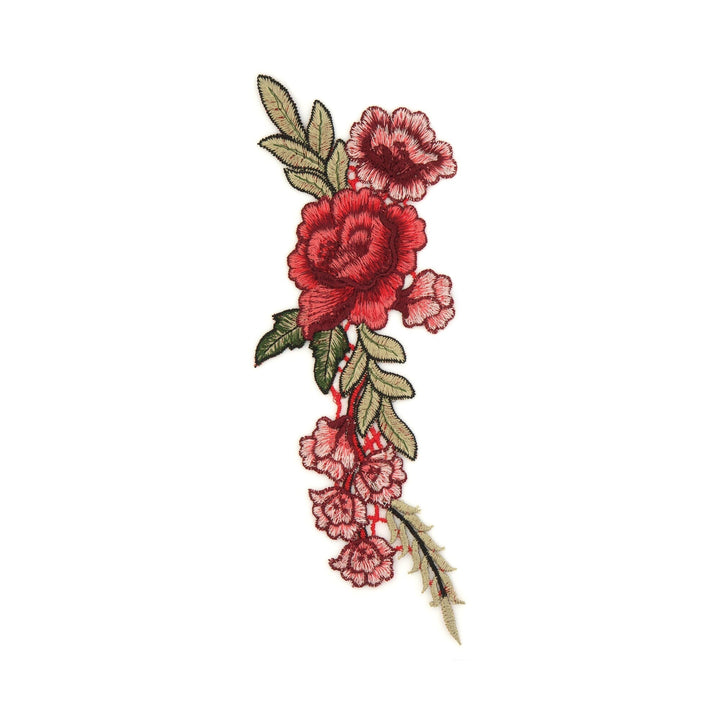 Embroidered floral design with red roses and green leaves on a white background
