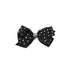 Black bow with silver studs on a white background