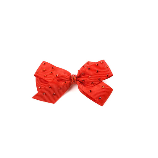 Red bow with decorative elements on a white background