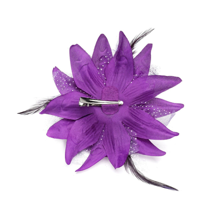 Purple flower hair clip with silver barrette on a white background
