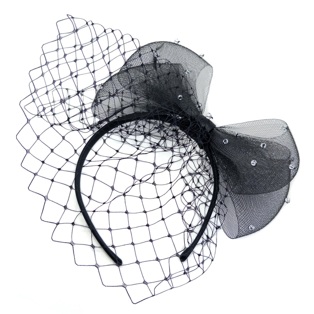 Black headband with netting and decorative bow on a white background