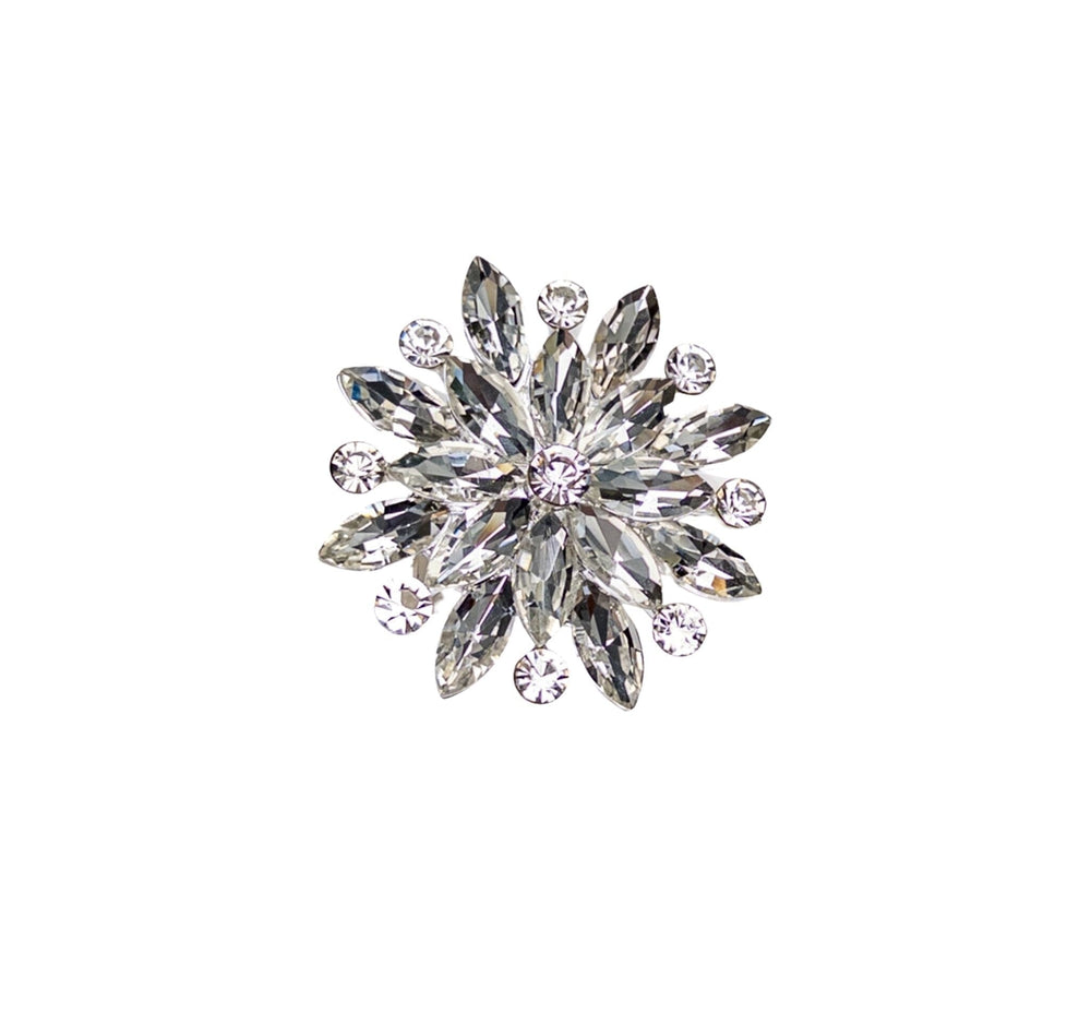 Crystal flower brooch on a white background