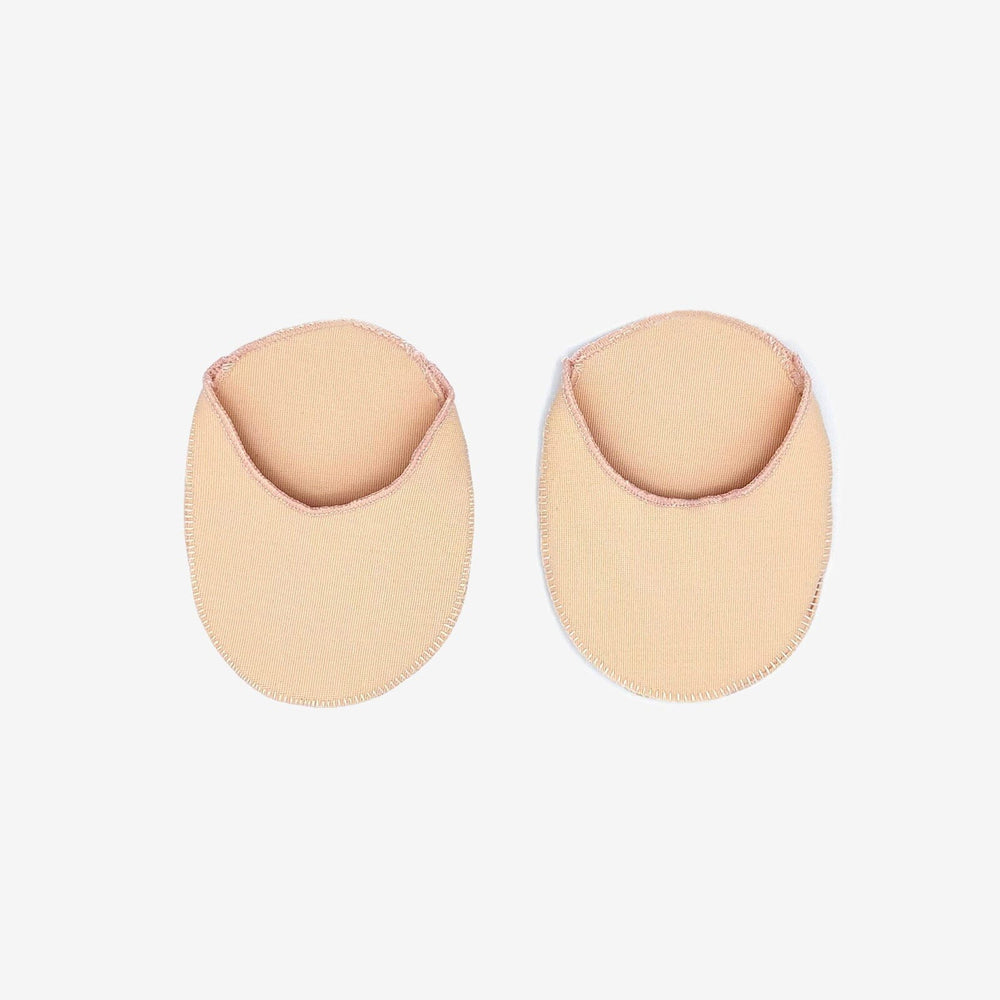 Pair of beige toe pads on a white background