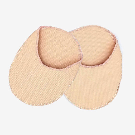 Pair of beige foam toepads on a light gray background