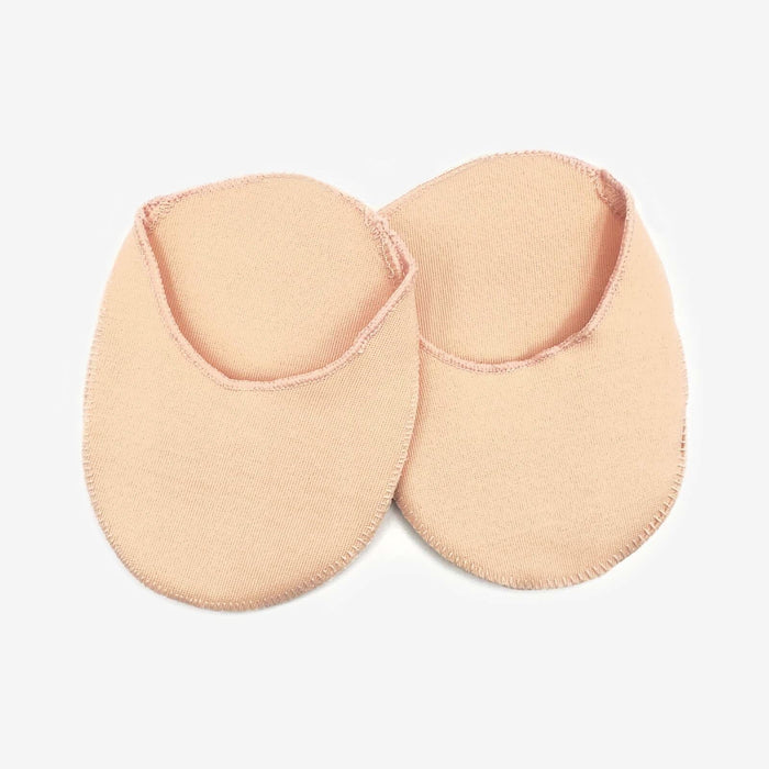 Pair of beige toepads on a light gray background
