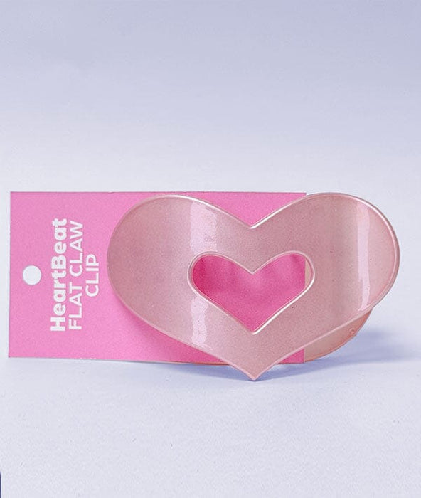 Heart-shaped clip with pink packaging on a light purple background