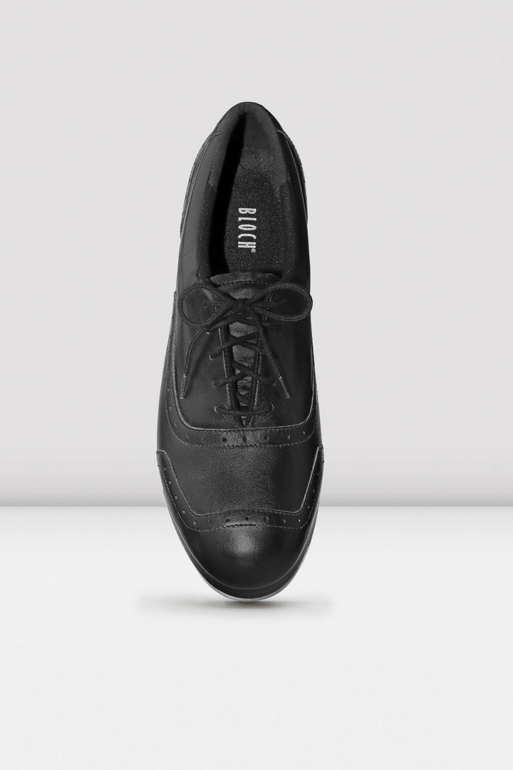 Black leather shoe on a white background