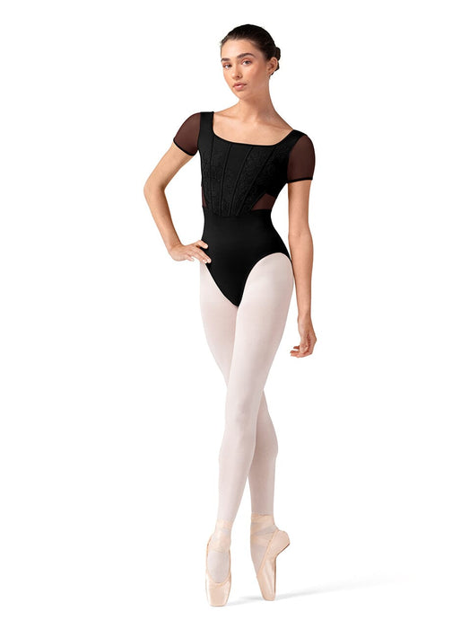Dancer in a black leotard and white tights on a white background