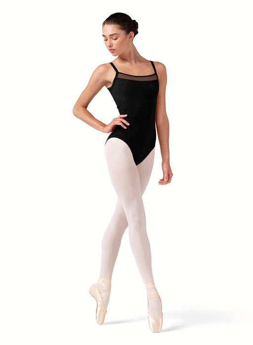 Ballerina in a black leotard and white tights on a white background