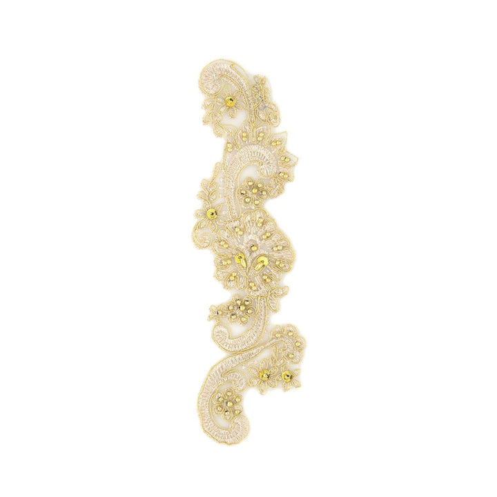 Decorative lace trim with gold embellishments on a white background