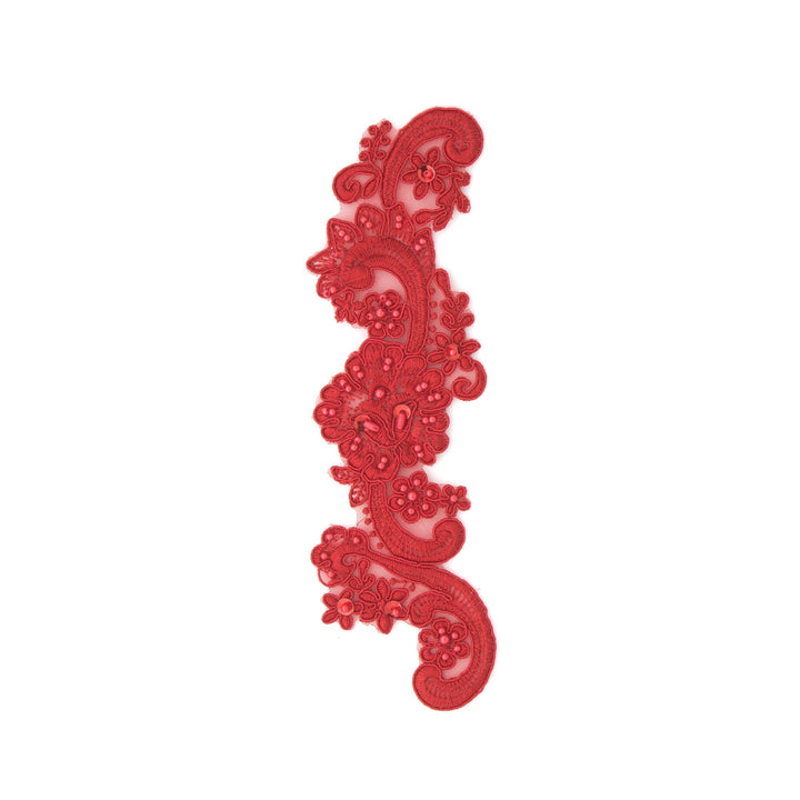 Decorative red lace trim on a white background