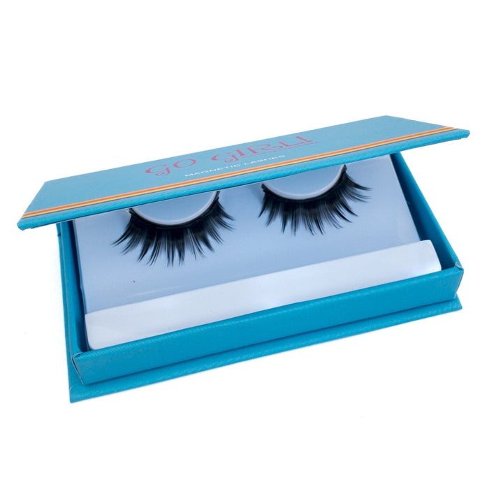 Blue box containing false eyelashes on a white background