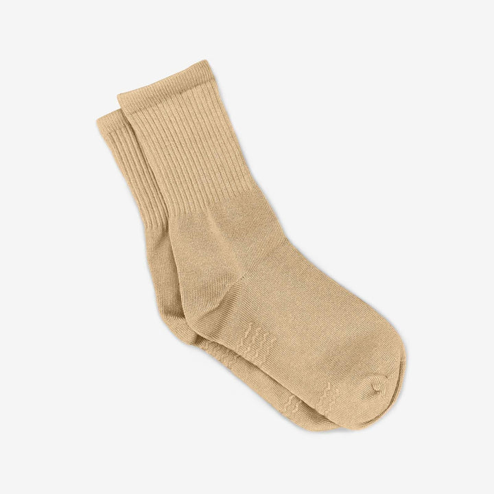 Beige sock on a white background