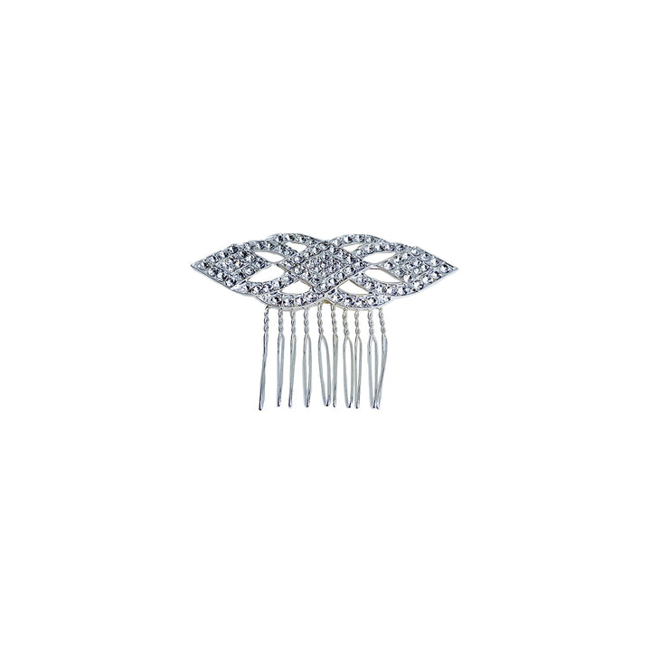Silver hair comb with gemstones on a white background