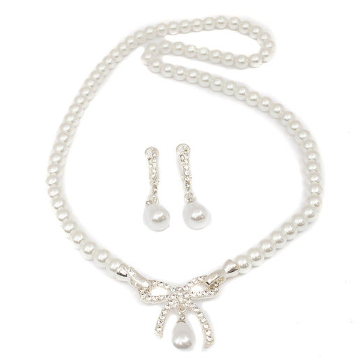 Pearl necklace with matching earrings on a white background