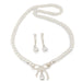 Pearl necklace with matching earrings on a white background
