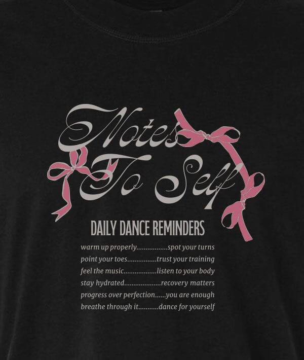 Black t-shirt with 'Notes To Self' text and pink ribbons on a black background