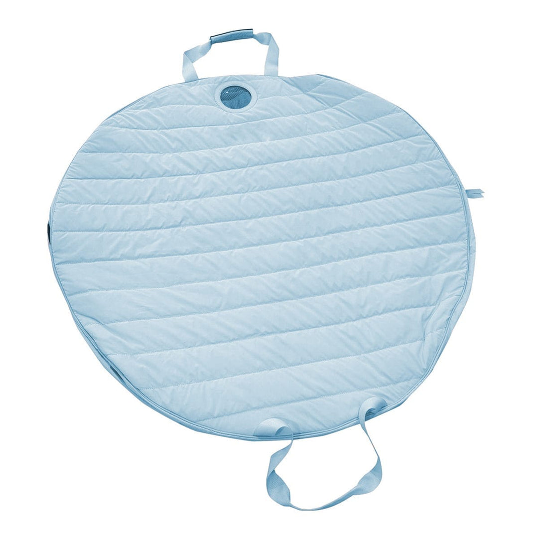 Round light blue quilted bag with handles on a white background
