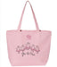 Pink tote bag with cartoon cats design and brand logo on a white background