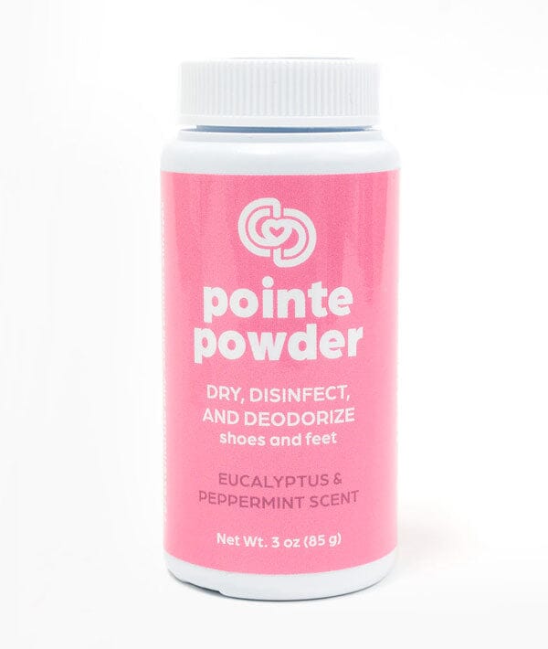 Pink container of pointe powder with white text on a white background