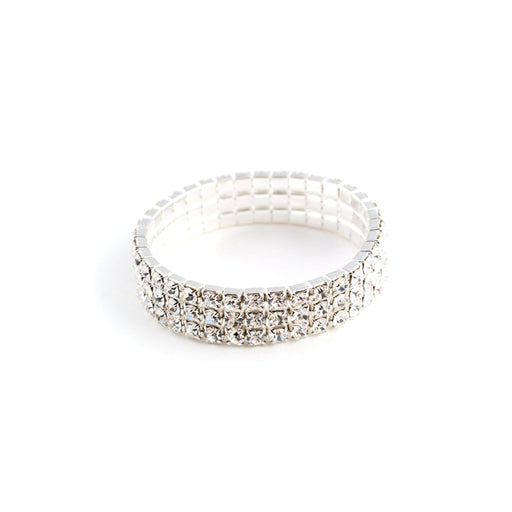 Silver ring with clear stones on a white background