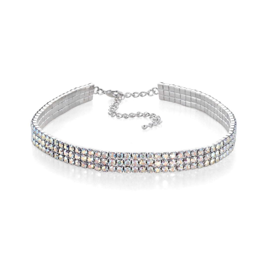 Silver choker necklace with clear stones on a white background