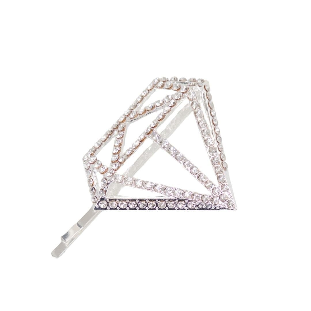 Triangular hairpin with rhinestone details on a white background