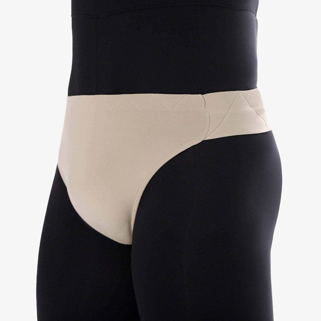 Black leggings with beige waistband on a white background