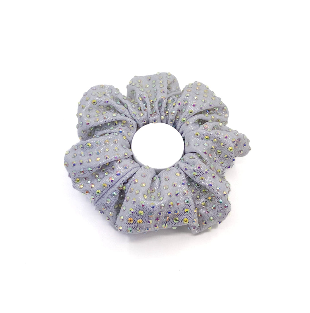 Gray scrunchie with colorful embellishments on a white background