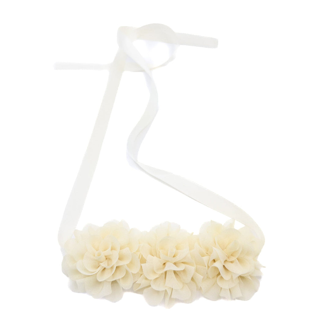 White floral headband on a white background