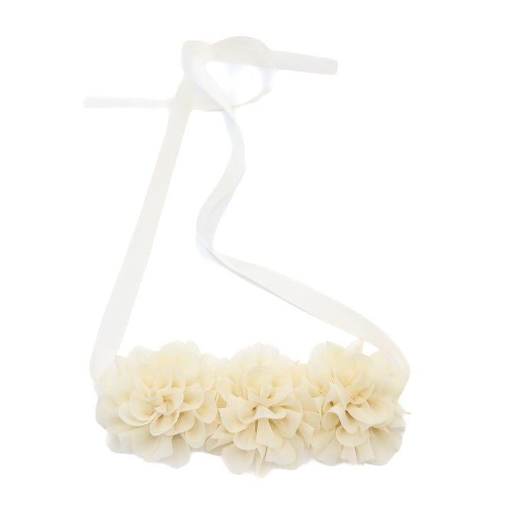 White floral headband on a white background