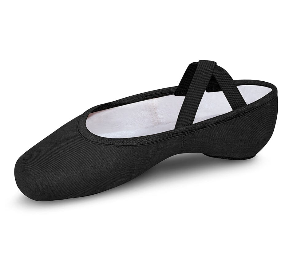 Black ballet shoe with white sole on a white background