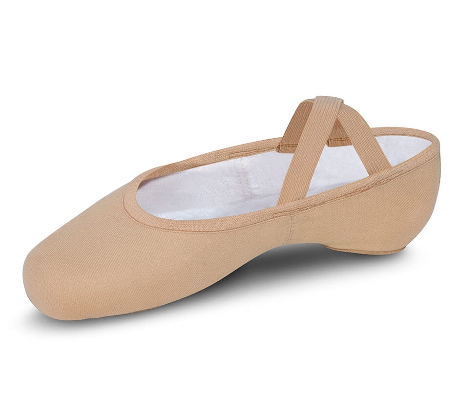 Beige ballet shoe with white lining on a white background