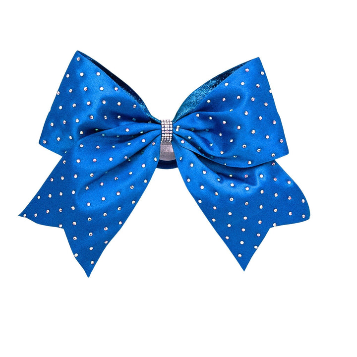 Blue polka dot bow with rhinestones on a white background