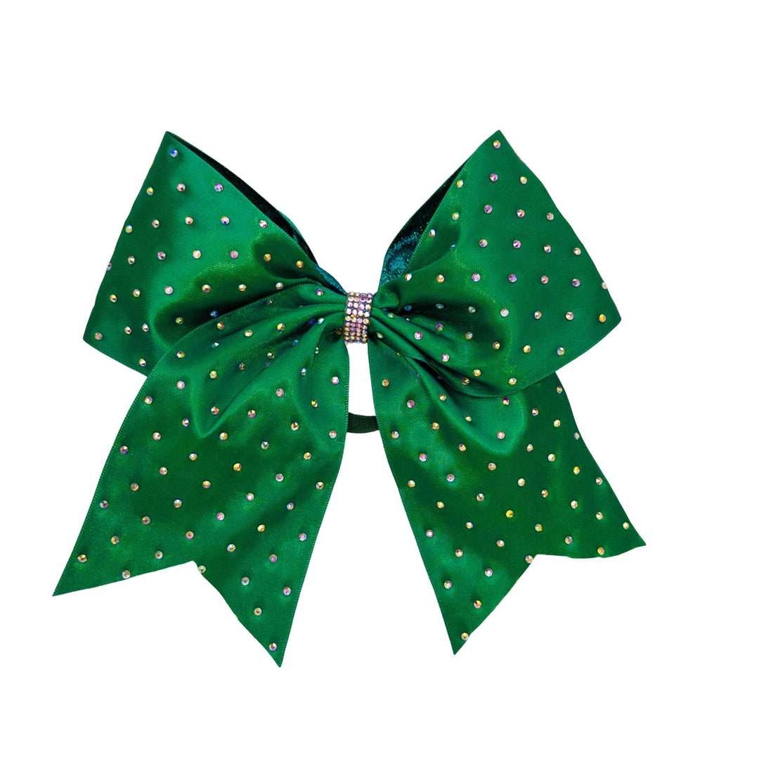 Green polka dot bow with rhinestones on a white background