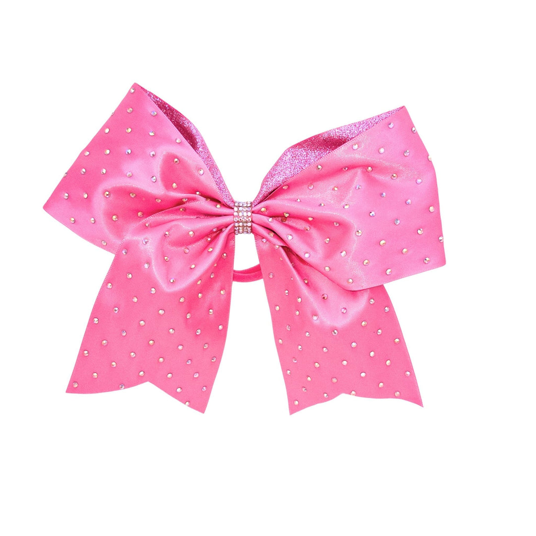 Pink bow with white polka dots on a white background