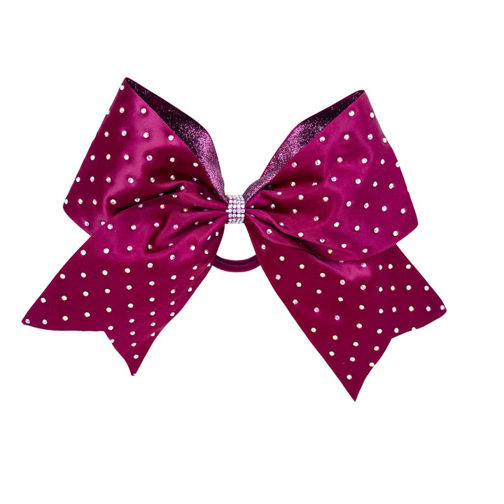 Large pink polka dot bow on a white background