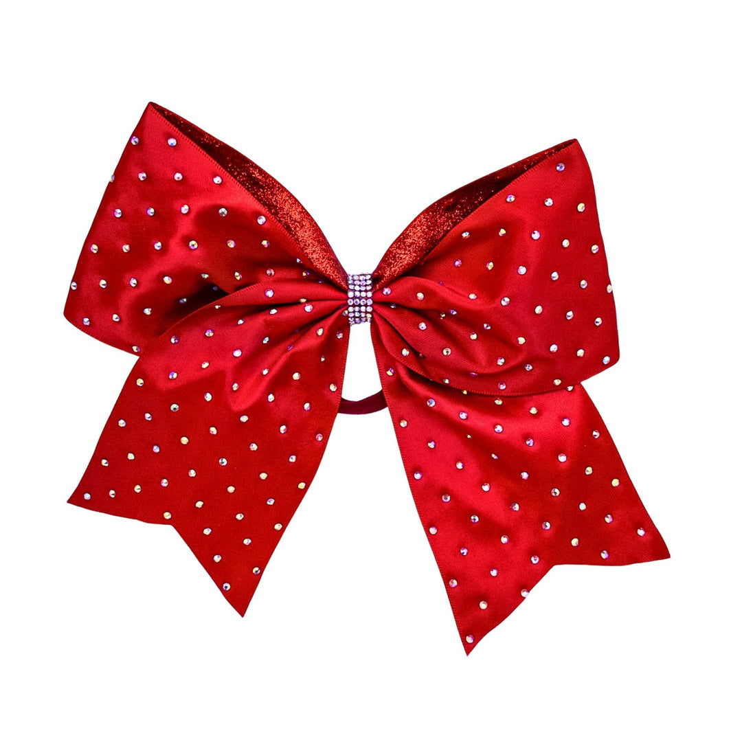 Red polka dot bow with rhinestones on a white background