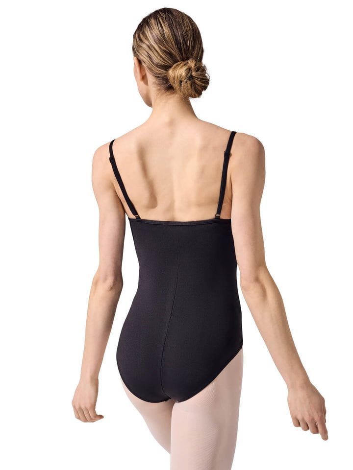 Person wearing a black leotard on a white background