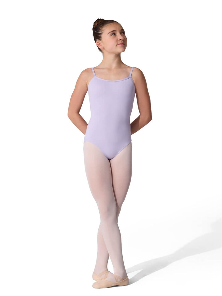 Ballerina in a lavender leotard and pink tights on a white background